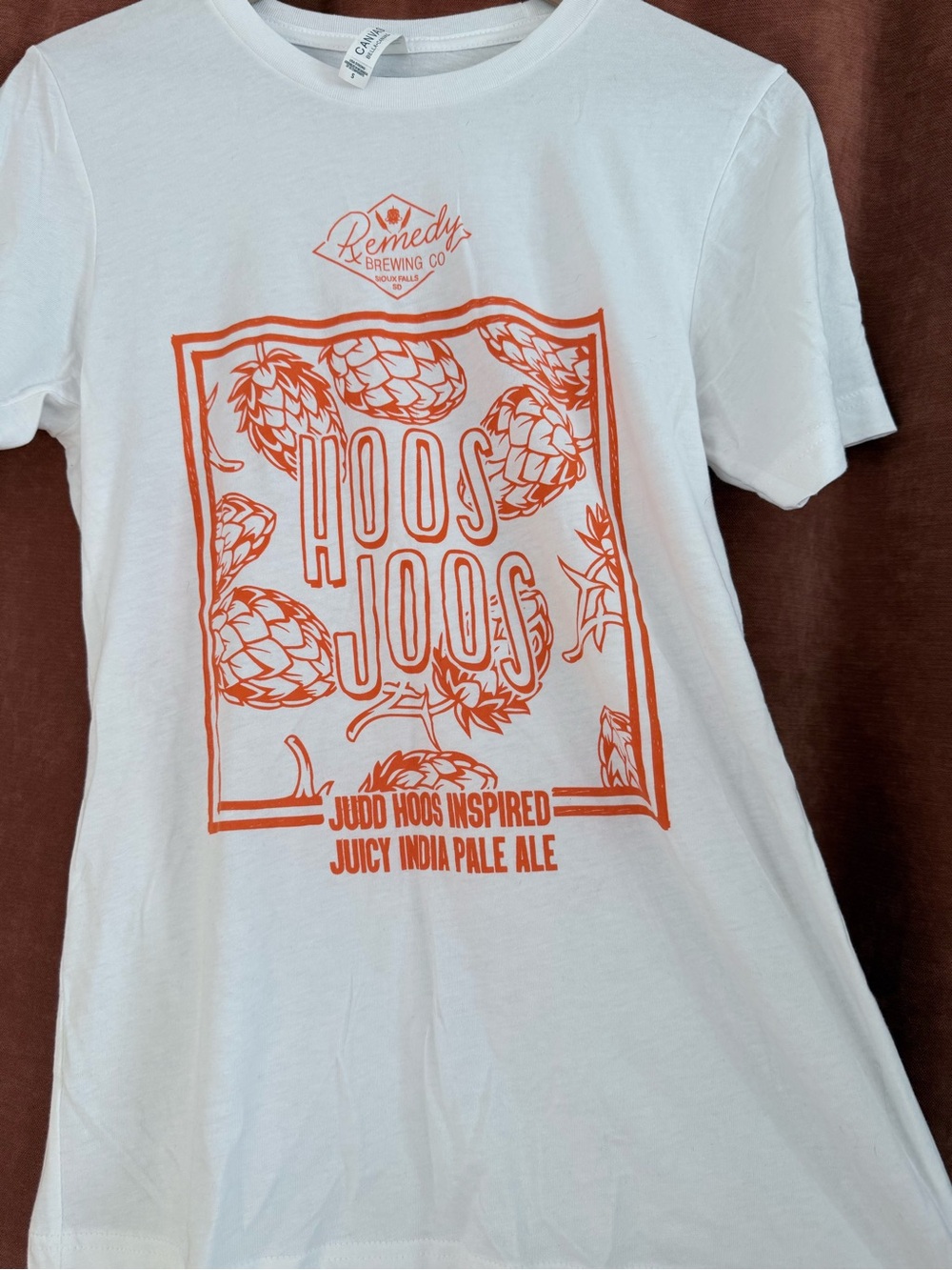 Bella Canvas White Tee with Orange Hoos Joos Graphic